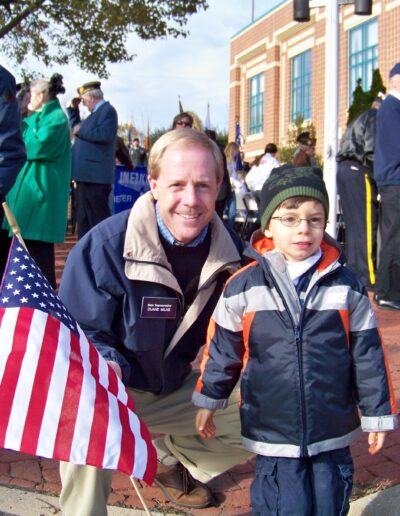 Duane and His (then)Young Son Enjoy a Veterans Parade